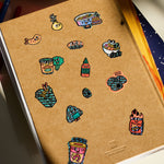 OMY Big Kitty - stickers applied on a notebook for personalisation