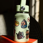 OMY Big Kitty - stickers on a laptop with kawaii cat motifs