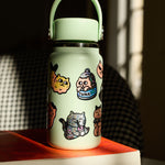 OMY Big Kitty - lifestyle scene with stickers on personal items