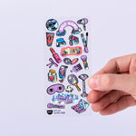 OMY Iconic Make Up — close-up of lipstick, palette and mirror stickers