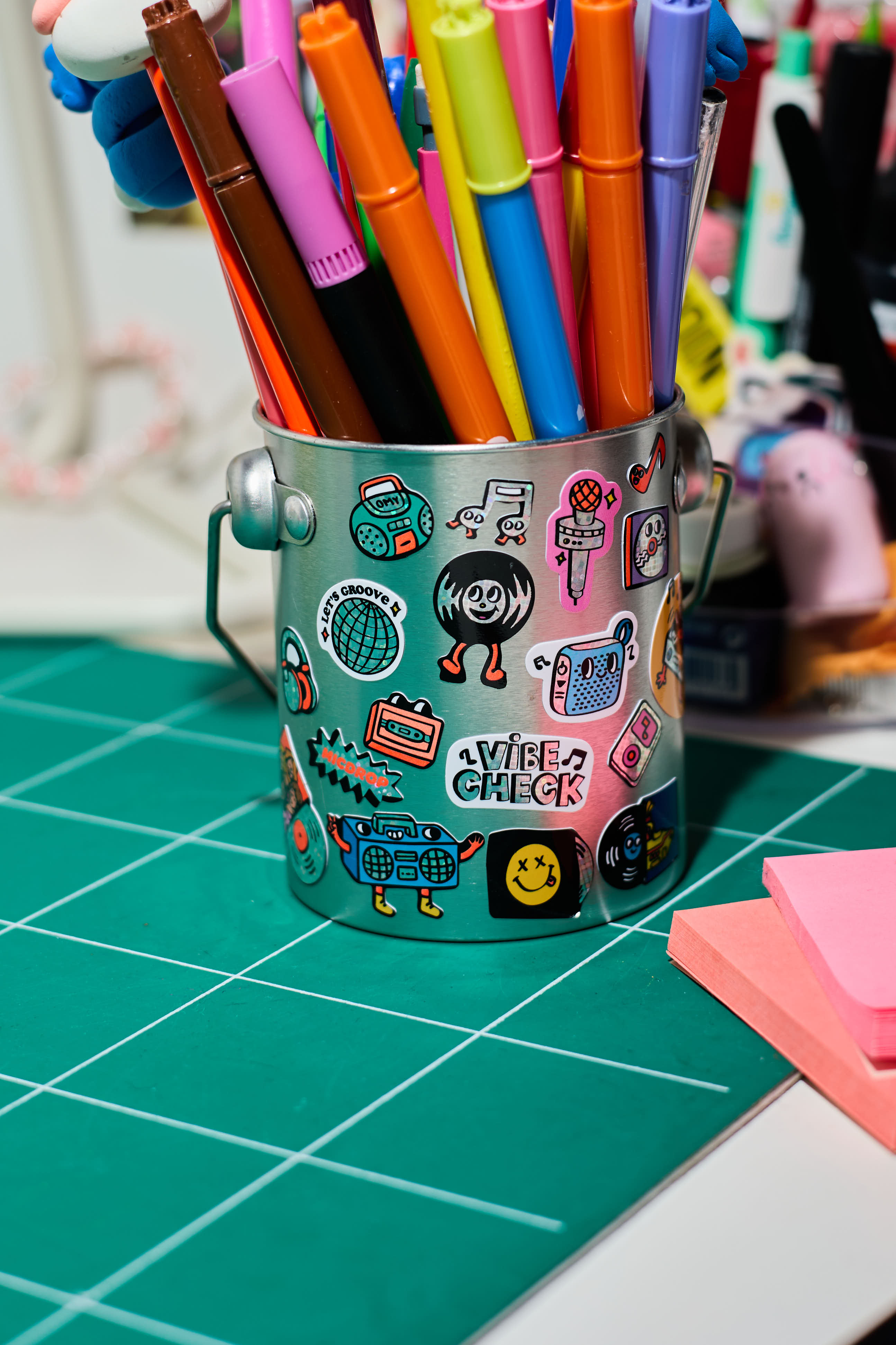 OMY Iconic Music — close-up of instrument and vinyl record stickers