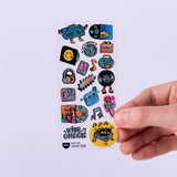 OMY Iconic Music — stickers applied on a notebook and water bottle